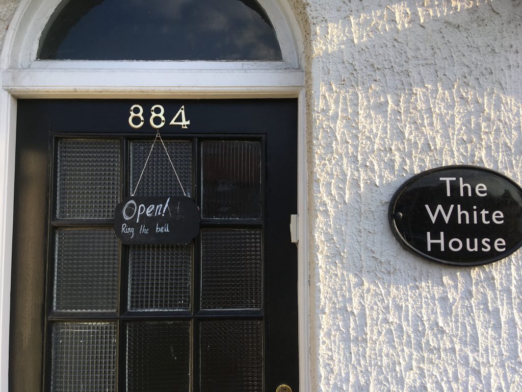 The door of The White House in Dagenham, a creative space that nurtures connection and invisible qualities.